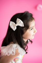 White taffeta bow hair accessory